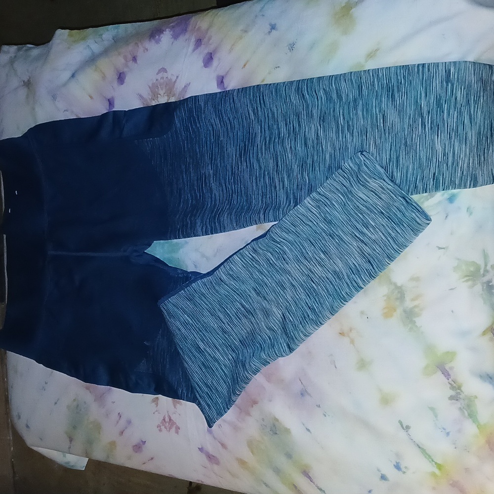 Teal blue lightings with pockets on each side closer to the side areadown to you